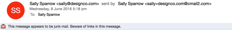 Outlook 2016, showing the notification "This message appears to be junk mail", as well as a different "sent by" address